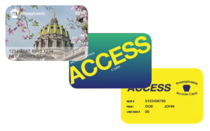 New state Capitol Building around Cherry Blossom Designed EBT Card, Older Blue Green ACCESS EBT Card, and Yellow and Navy Blue Medical Assistance Card from State of PA